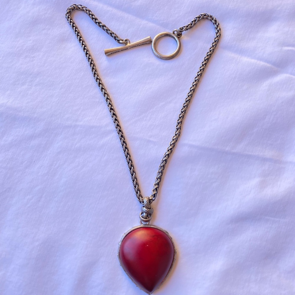 Necklace with silver 16” chain.